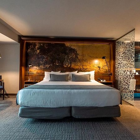 Hotel Cumbres Lastarria Santiago Exterior photo A suite at the hotel